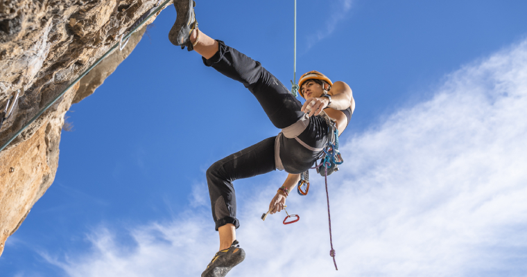 Woman rock climbing