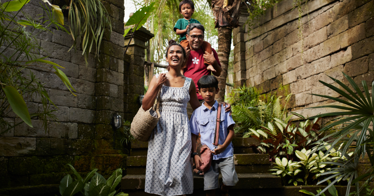 A family walking on a path in bali