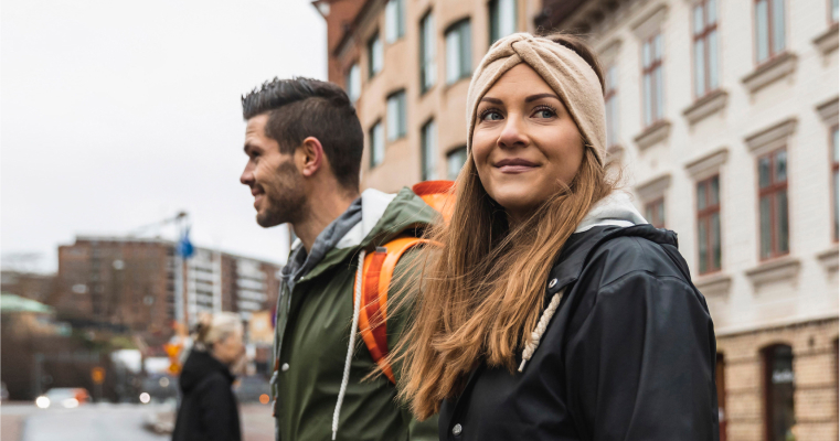 A couple walking through a European city